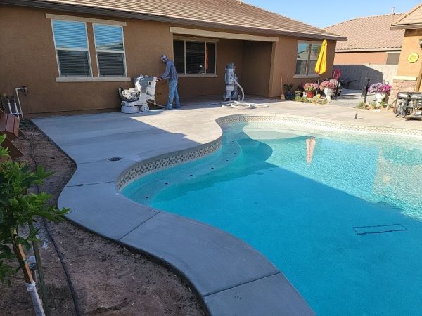 Revitalize Your Outdoor Oasis: Is a Drab Concrete Pool Deck Ruining Your View